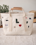 The Icon Edit Utility Canvas Crossbody Tote Bag